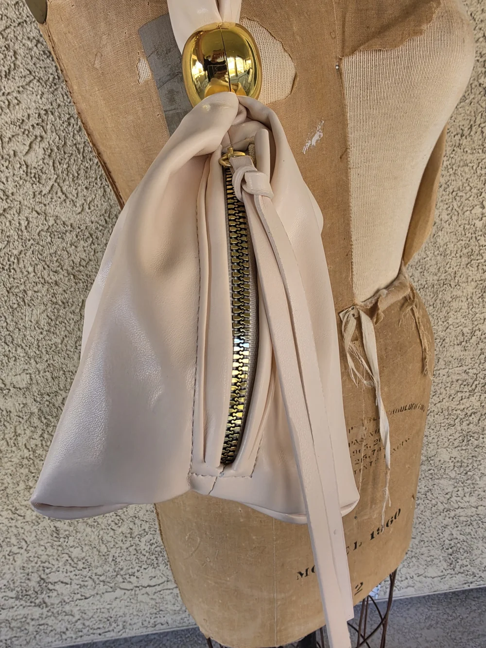 Elegant Cream Gathered Clutch with Gold Accent